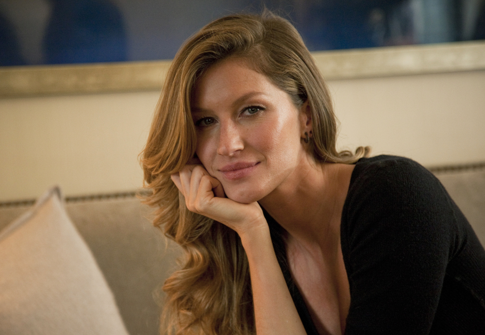 Gisele Bundchen is shown in January posing for a portrait in New York. Married to Patriots quarterback Tom Brady, Bundchen says the couple tries to keep job stress out of the house.