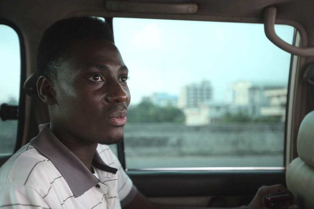 In this Wednesday, Nov. 17, 2011 file photo, Rashidi Williams, a gay man, rides in a car in Lagos, Nigeria. Local and international groups fighting AIDS warned on Tuesday that a new Nigerian law criminalizing same-sex marriage and gay organizations will jeopardize the fight against the deadly disease.