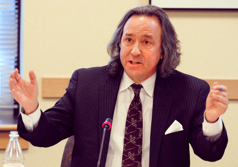 Rep. Drew Gattine, D-Westbrook, asks a question of consultant Gary Alexander during a meeting of the Legislature’s Health and Human Services Committee in Augusta.