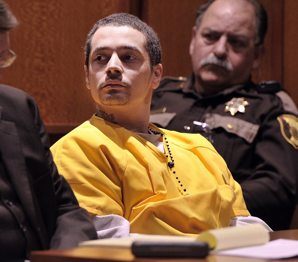 Joel Hayden, who is convicted of murdering his children’s mother and a friend, attends court in February 2013.