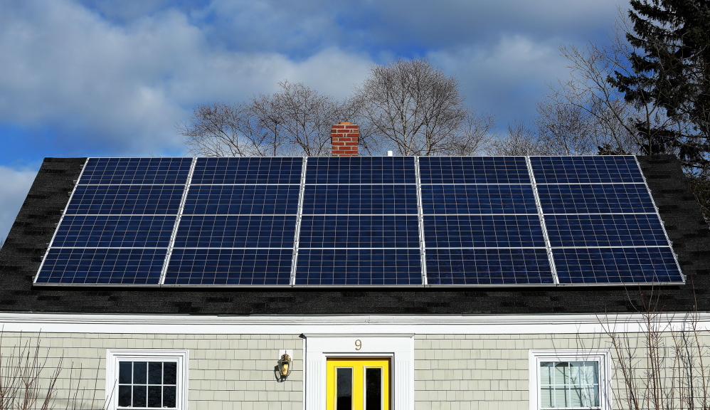 A solar panel array on the roof of a house on Lynda Road in Portland gathers sunlight Wednesday. Maine has only three to four megawatts of installed capacity at a time when solar power is taking off around the Northeast.