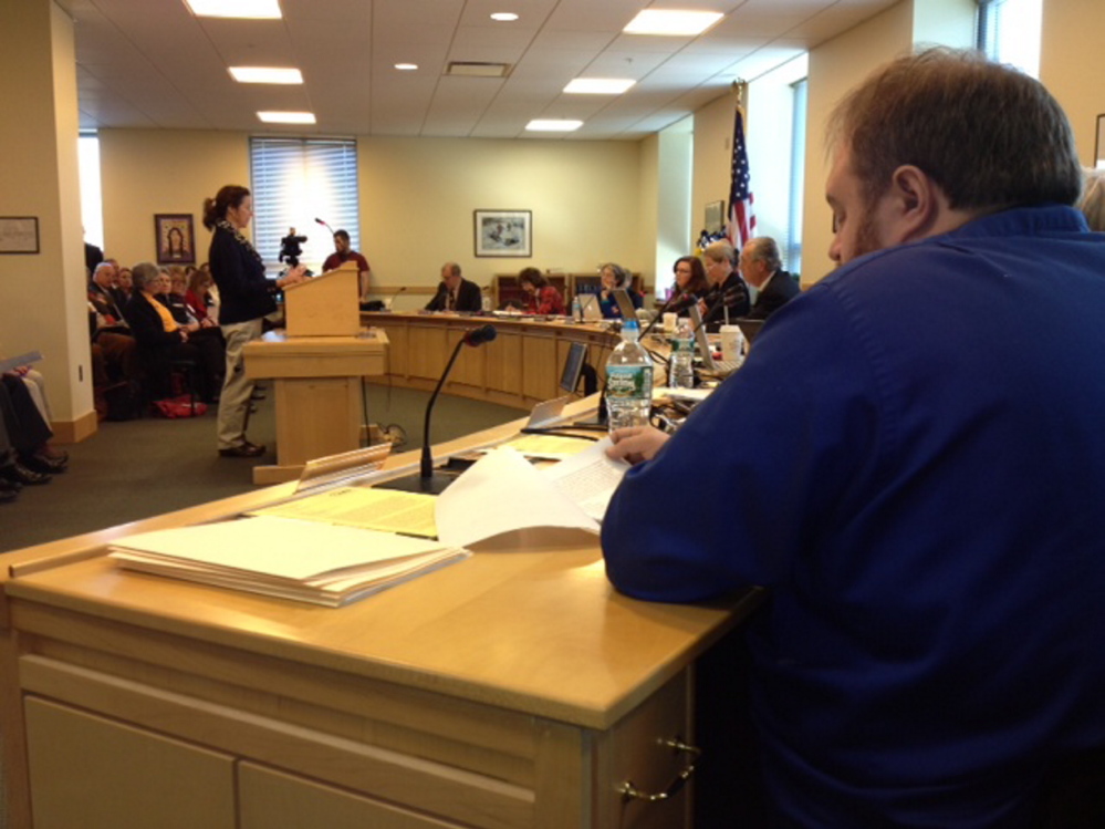 Paula Sutton of Warren testifies against Medicaid expansion Wednesday before the Maine Legislature’s Health and Human Services Committee.