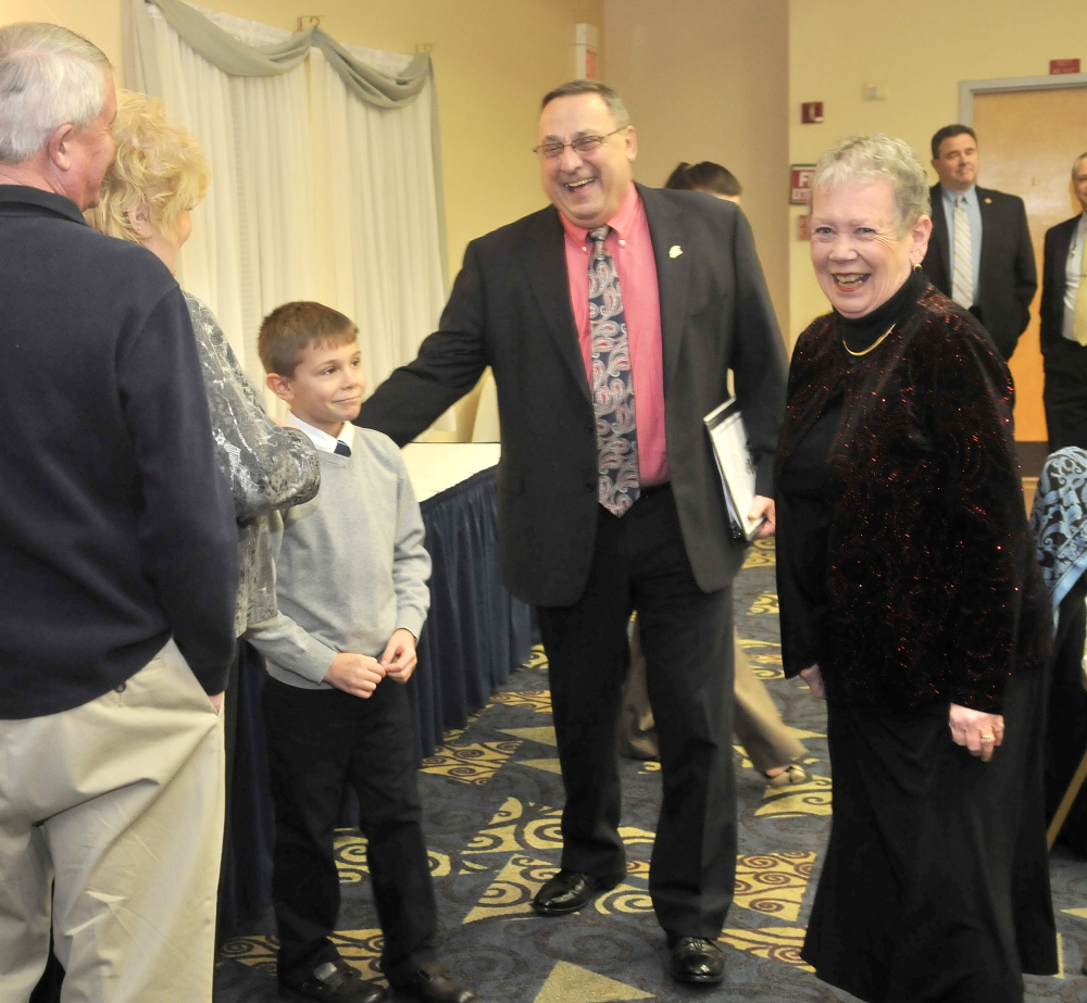 NEW FRIENDS: Gov. Paul LePage laughs with Kaden Fitzmorris, 8, at the Maine Children’s Home for Little Wanderers at the annual dinner at the Elks Lodge in Waterville.