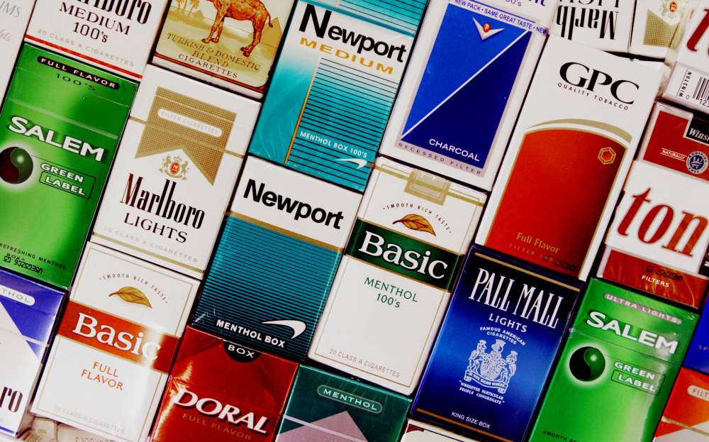 This 2005 photo shows packs of cigarettes in a store in Brunswick. Each day, more than 3,200 youths smoke their first cigarette.