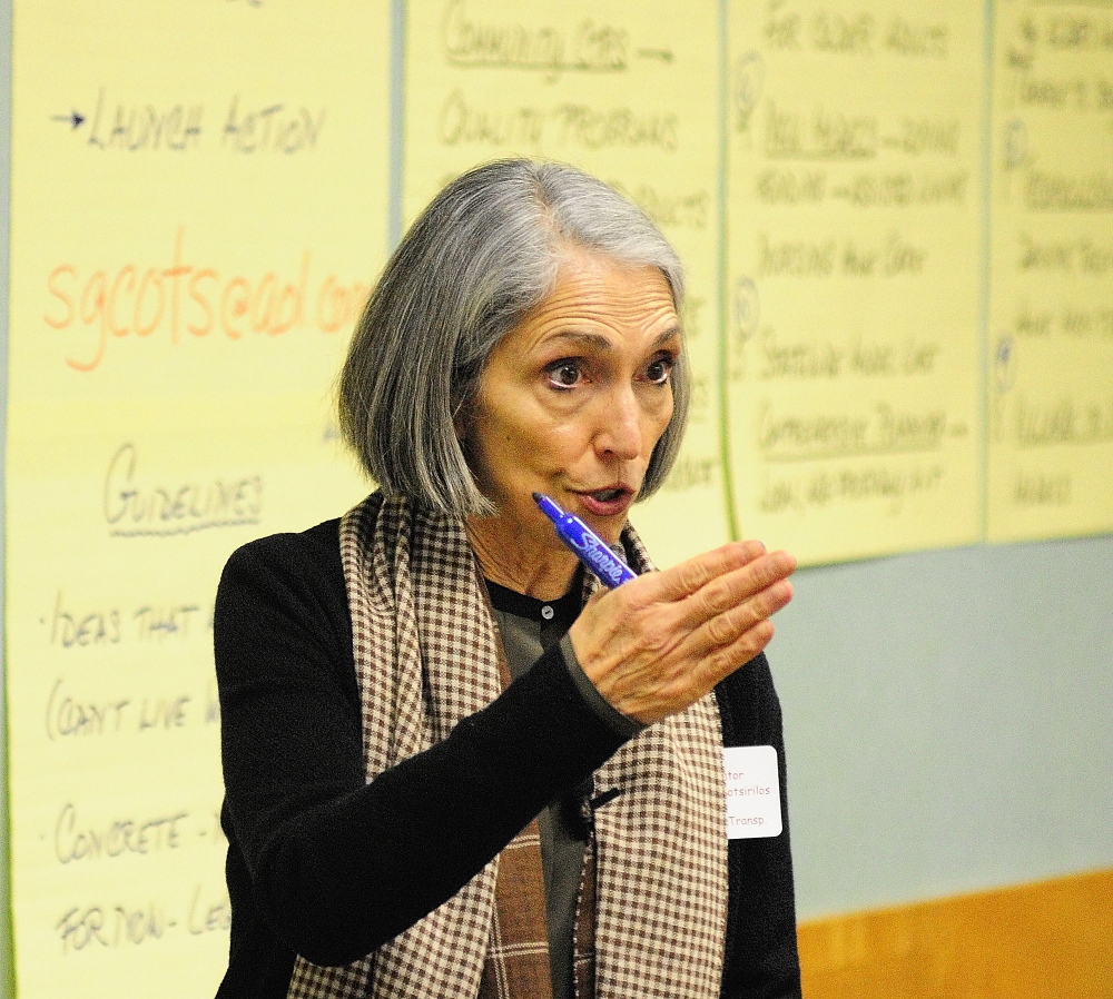 Stephanie Cotsirilos facilitates a session during the Maine Summit on Aging on Friday in Augusta.