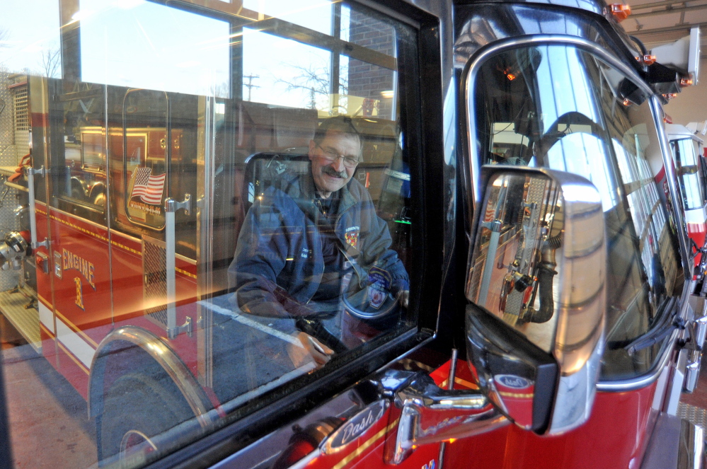 last ride: Capt. Richard Knight takes the front seat for his last ride home at his retirement party at the Farmington fire station on Friday. Knight served the Farmington community as a firefighter for 35 years.