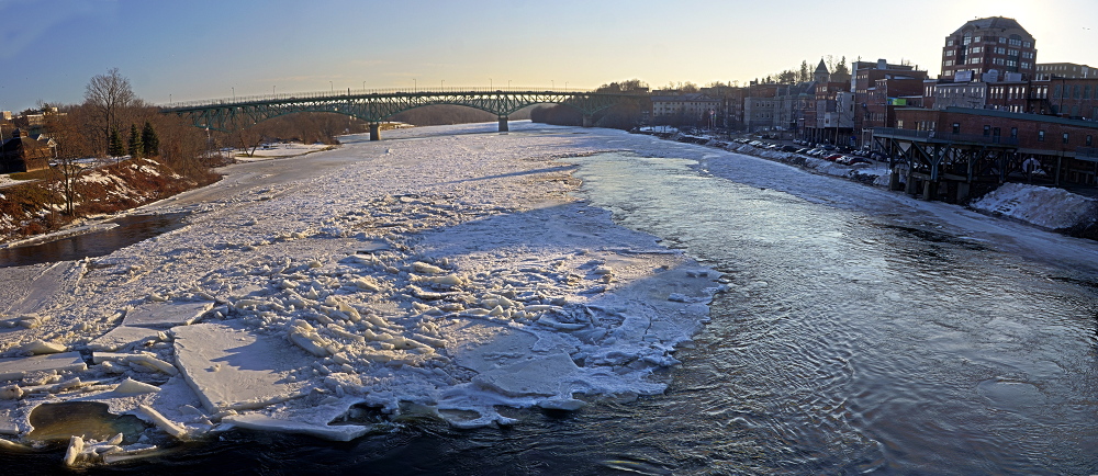 Staff photo by Joe Phelan Slabs of ice the Kennebec RIver in downtown Augusta can be seen piling up in a panoramic photo taken on Friday Jan. 17, 2014 from the Calumet Bridge at Old Fort Western in downtown Augusta.