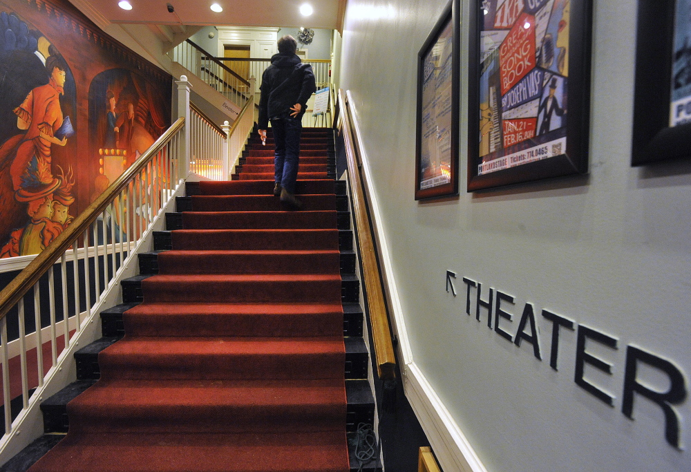 A theater patron climbs the stairs to Portland Stage Company’s 75-seat Studio Theater. The company’s production manager, Andrew Harris, says his immediate task in 2014 is trying to accommodate all the directors who want to book the theater.