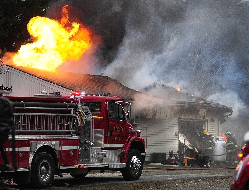 FIRE IN PITTSTON: Firefighters battle a blaze on Saturday in a large attached garage at 1083 Wiscasset Road in Pittston. Pittston, Gardiner, West Gardiner, Dresden, Wiscasset, Whitefield, Chelsea, Farmingdale and Randolph responded to the fire, which was reported around 3 p.m.