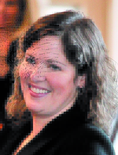 Rep. Emily Cain, seen here in 2012, has a financial edge among Democrats in her bid for the 2nd Congressional District seat in Maine.