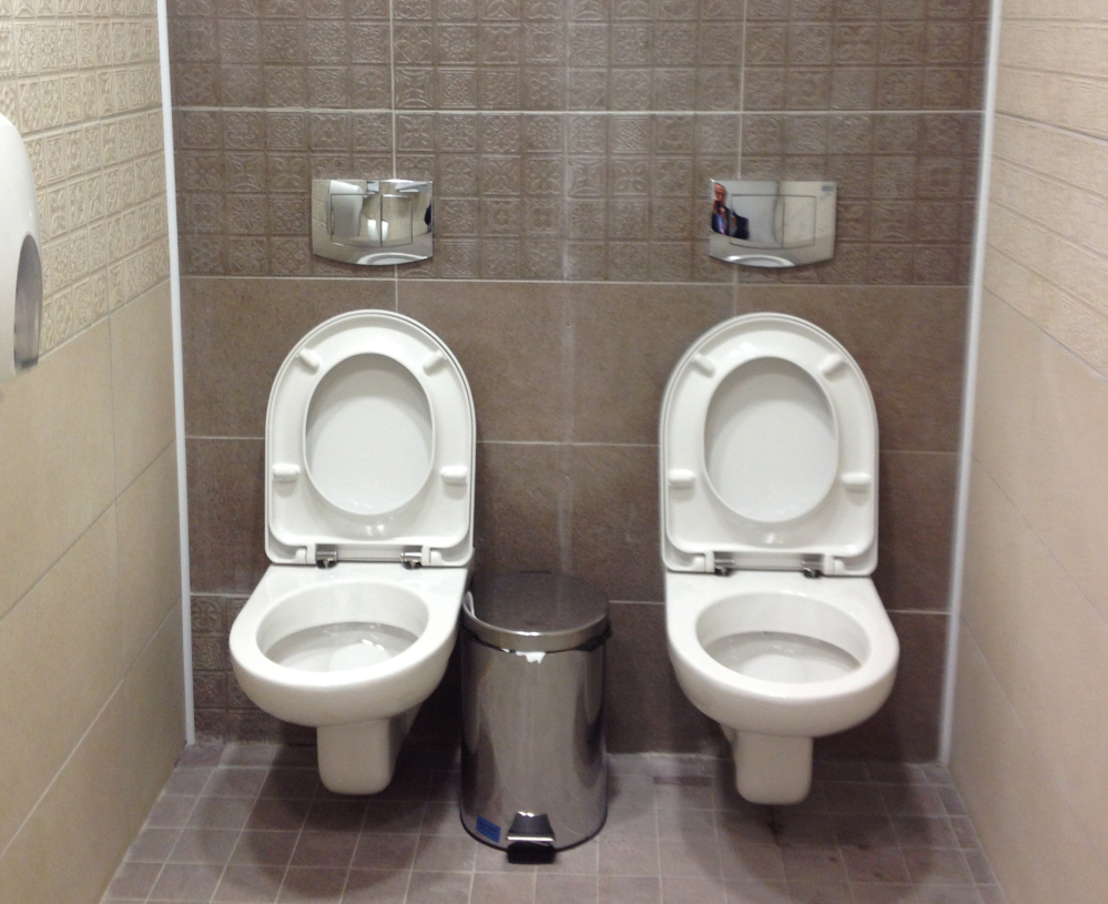 This photo taken on Friday Jan. 17, 2014, shows two toilets at the cross-country skiing and biathlon center for next month Olympics in Sochi, Russia.