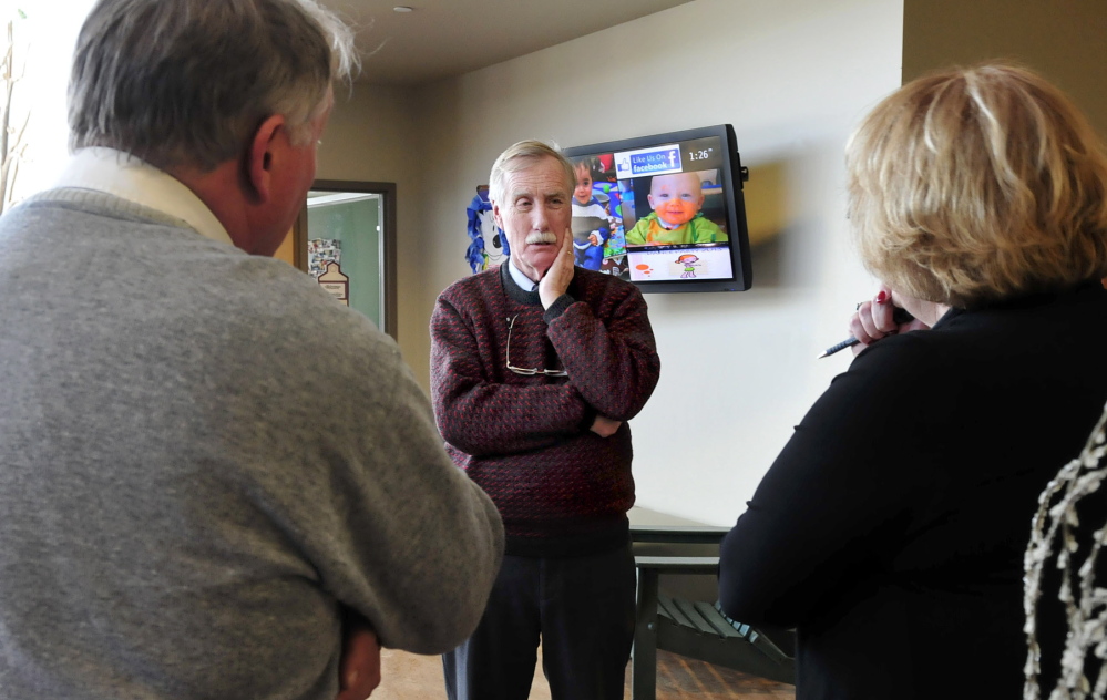 EARLY EDUCATION: U.S. Sen. Angus King, center, listens to comments from Eric Haley, superintendent of AOS 92, and Kathy Colfer of Educare Central Maine during a tour in Waterville on Wednesday, Jan. 22, 2014.
