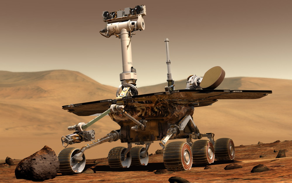 An artist rendering released by NASA shows the rover Opportunity on the surface of Mars. Opportunity landed on the red planet on Jan. 24, 2004, and is still exploring. Its twin Spirit stopped communicating in 2010. It costs about $14 million a year to maintain Opportunity.