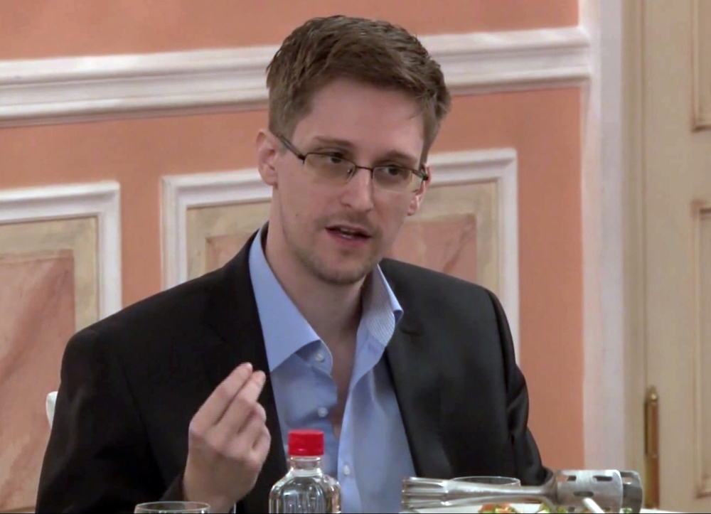 In this image made from video and released by WikiLeaks, former National Security Agency systems analyst Edward Snowden speaks during a presentation ceremony for the Sam Adams Award in Moscow, Russia, on Oct. 11, 2013.