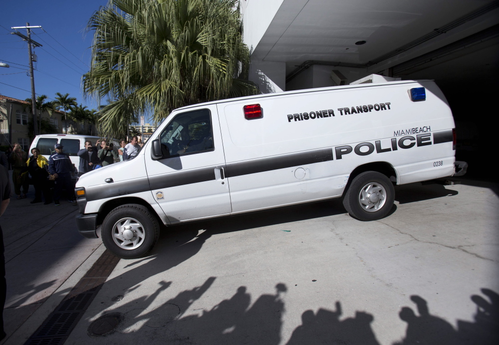 This prisoner transport van leaving the Miami Beach Police building Thursday morning was believed to be carrying pop singer Justin Bieber and R&B singer known as Khalil after their arrest.