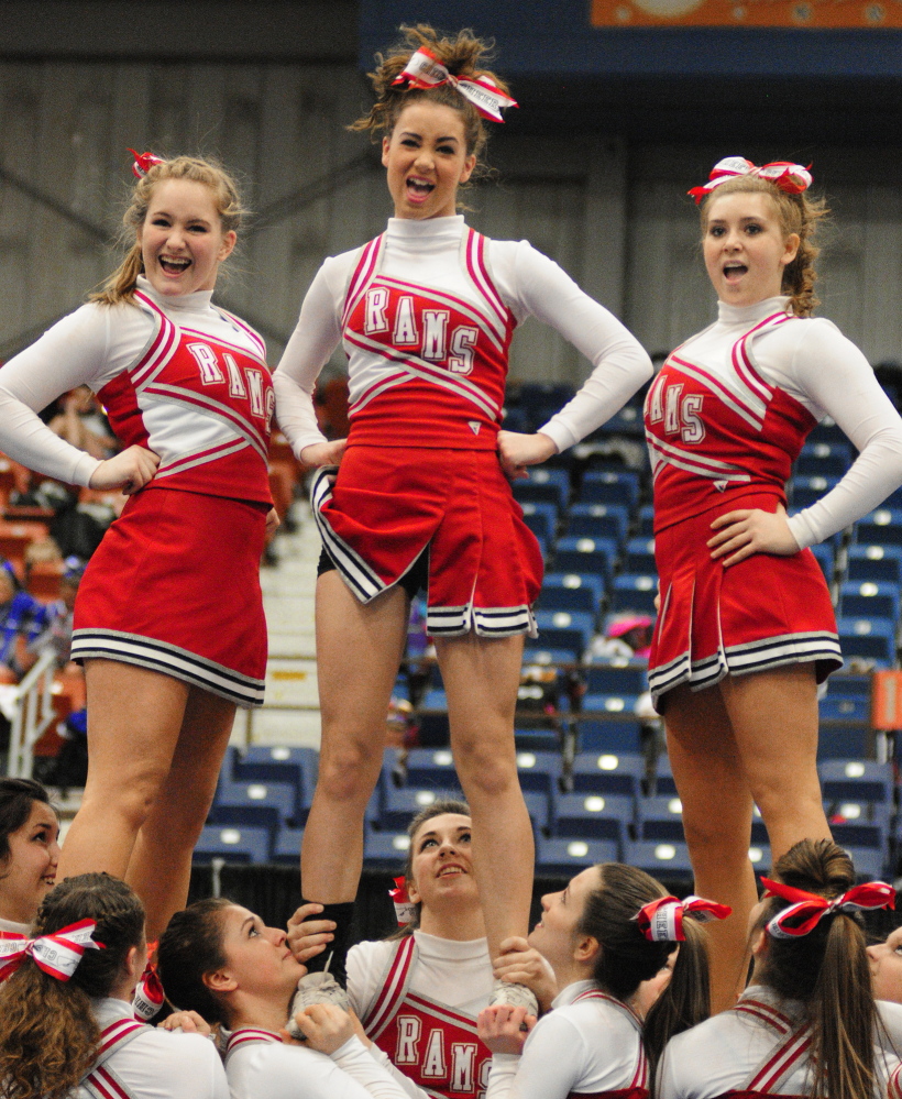 Staff photo by Joe Phelan The Cony Rams do a stunt during the Class A East cheering championship on Saturday January 25, 2014 in the Augusta Civic Center.