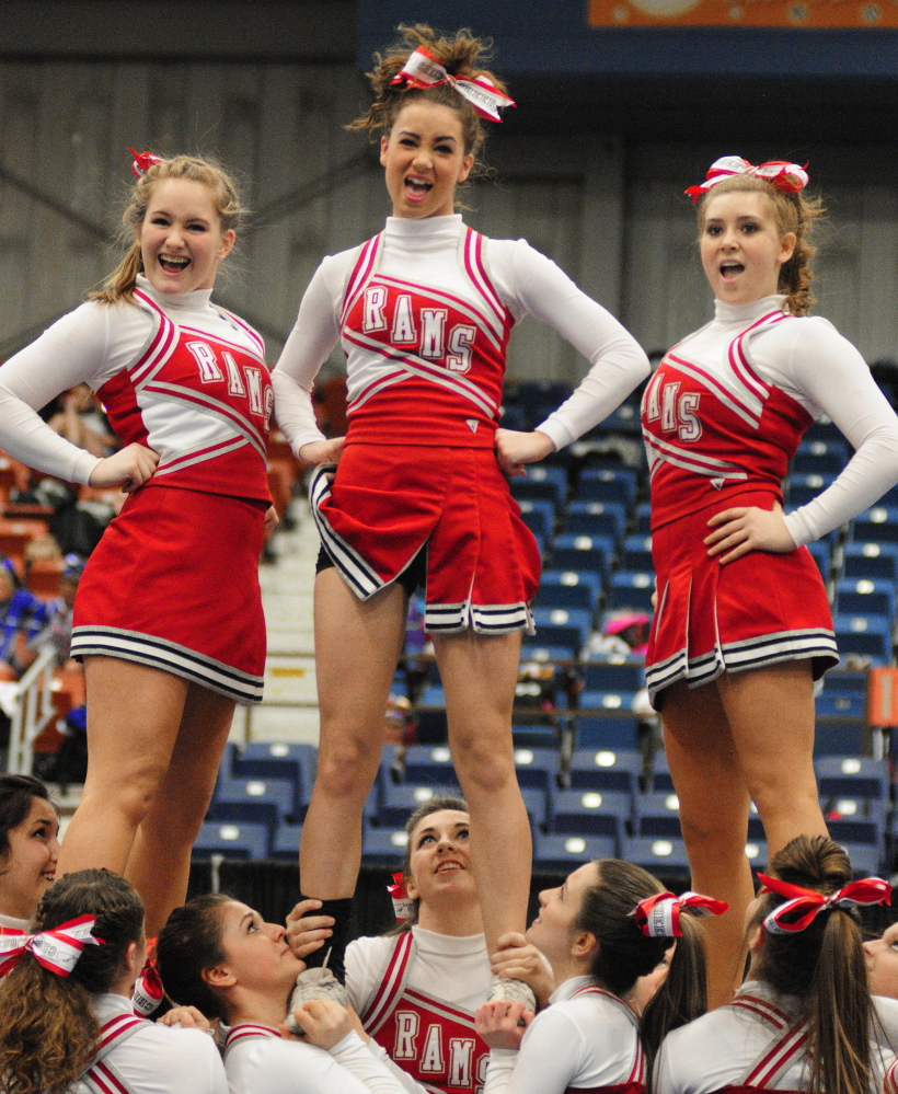 Staff photo by Joe Phelan The Cony Rams do a stunt during the Class A East cheering championship on Saturday January 25, 2014 in the Augusta Civic Center.