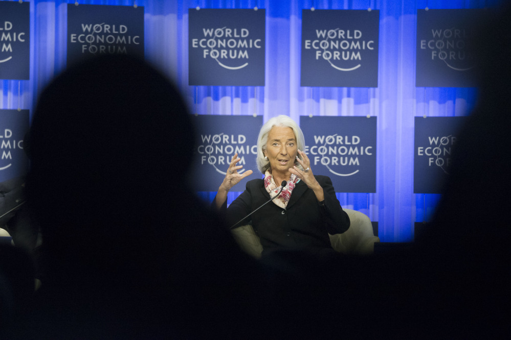 Head of the International Monetary Fund Christine Lagarde gestures as she speaks during a session at the World Economic Forum in Davos, Switzerland, on Saturday.