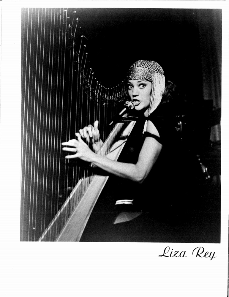 Liza Rey Butler plays the harp at a nightclub in the 1970s. She earned a master’s degree in performance harp from the University of Arizona.