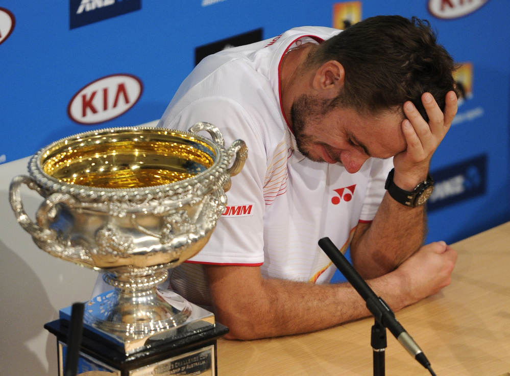 Stanislas Wawrinka is very emotional at a press conference Sunday after defeating Rafael Nadal in the men’s singles final at the Australian Open.