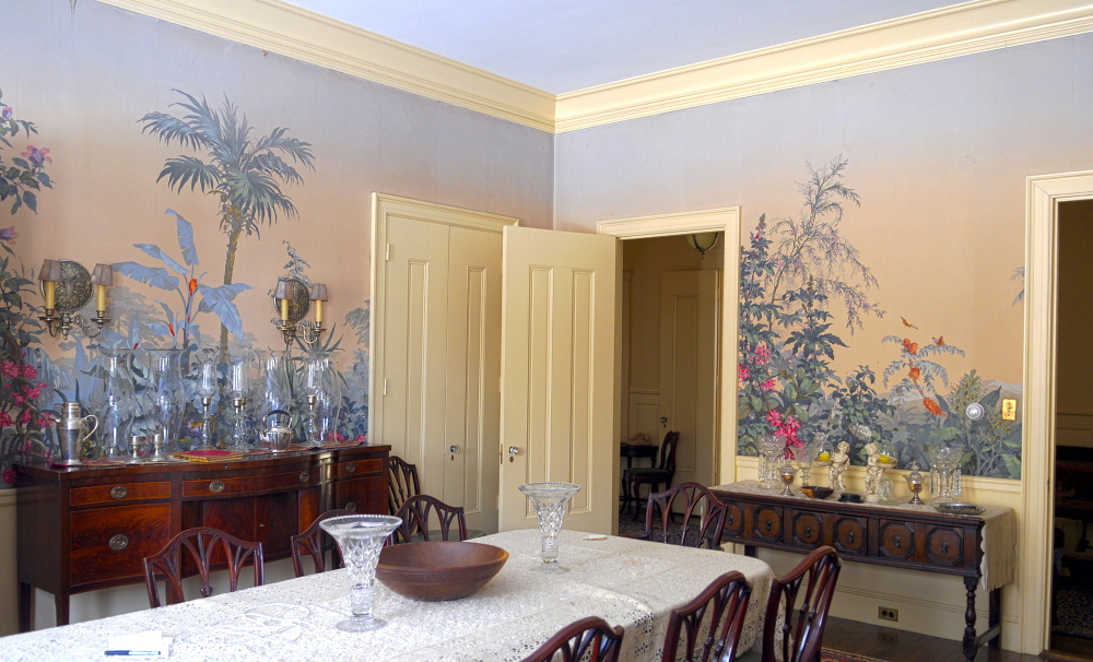 the dining room with tropical wallpaper on Thursday January 23, 2014, in the Daniel Cony Weston House on Stone Street that’s home to the Elsie & William Viles Foundation in Augusta.