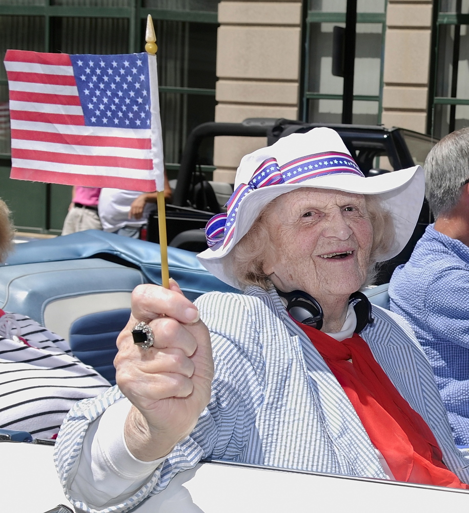 GRAND MARSHAL: Elsie Viles rides down Water Street in Augusta when she was the 2008 Independence Day parade grand marshal.