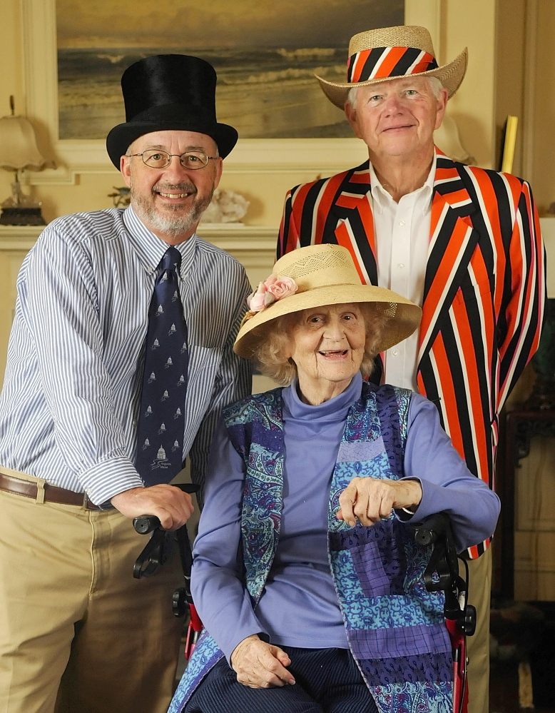 William Bridgeo, Warren Wilson and Elsie Viles model hats at her Augusta home in 2009.