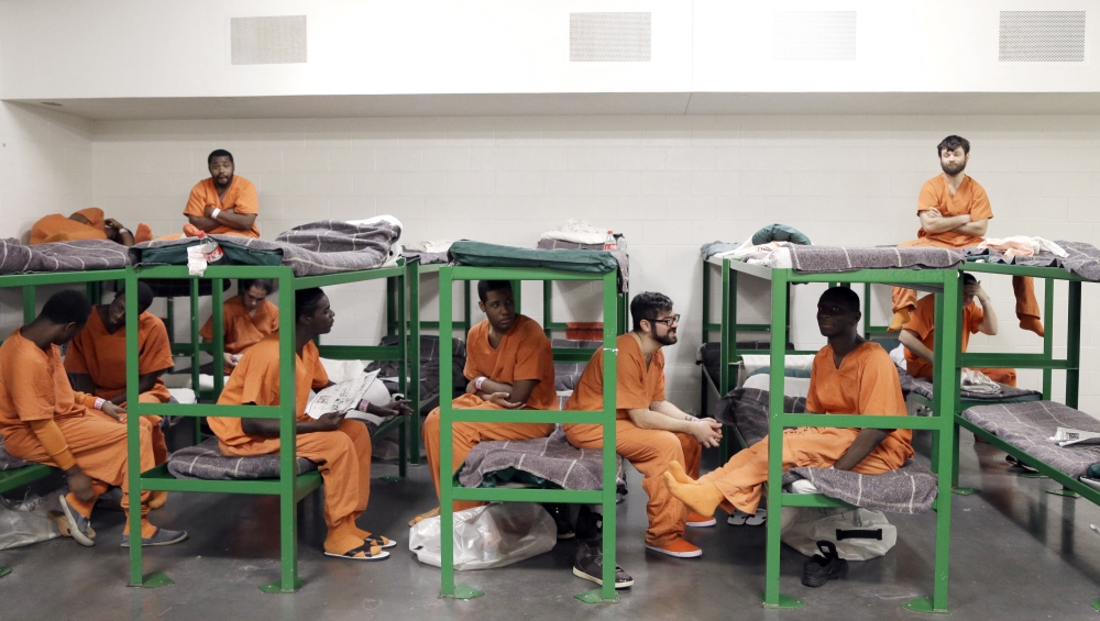 Inmates hang out on their bunks in a new unit in the Harris County Jail for gay, bisexual and transgender inmates in December in Houston, Texas.