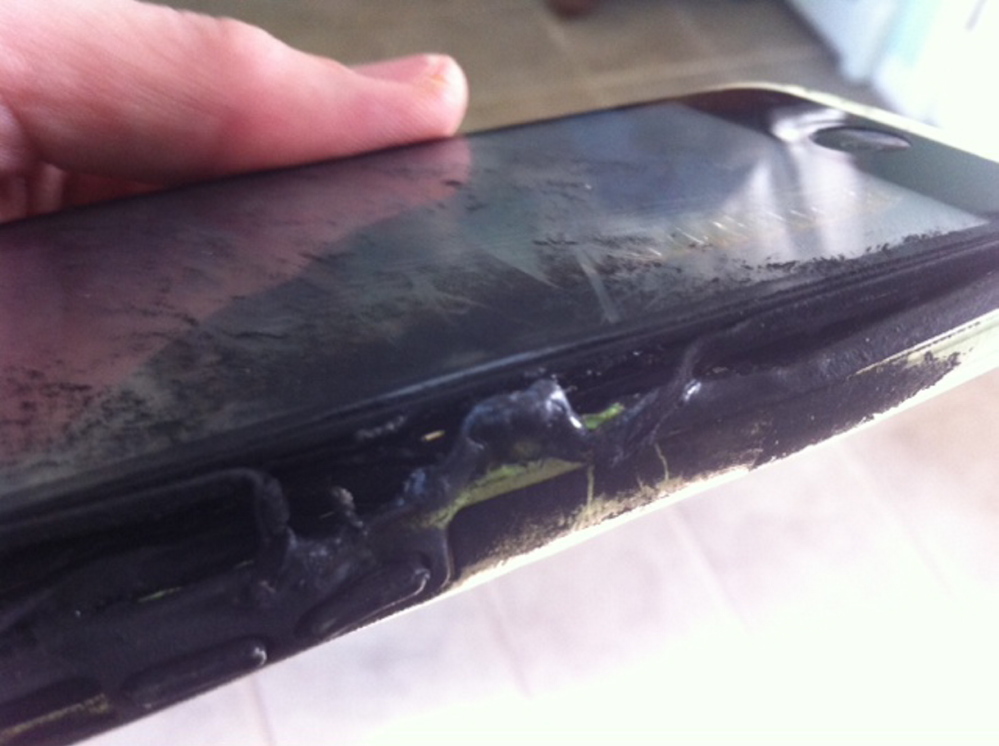 This iPhone is charred after catching fire in the pocket of a Kennebunk middle school student. The phone used to be green.
