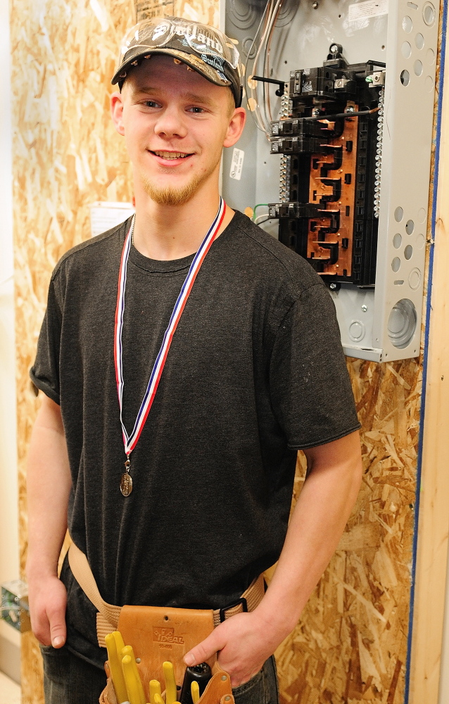 Staff photo First year electrician student Travis Robbin, a junior at Richmond High School, took second place in the SkillsUSA event on Friday January 31, 2014 at the Capital Area Technical Center Augusta.