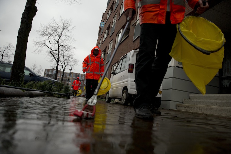 Three alcoholics set out on their daily route to collect litter in Amsterdam on Wednesday.