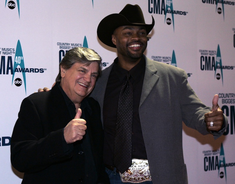 Phil Everly, left, and Cowboy Troy arrive at the 40th Annual CMA Awards in Nashville, Tenn., in November 2006.