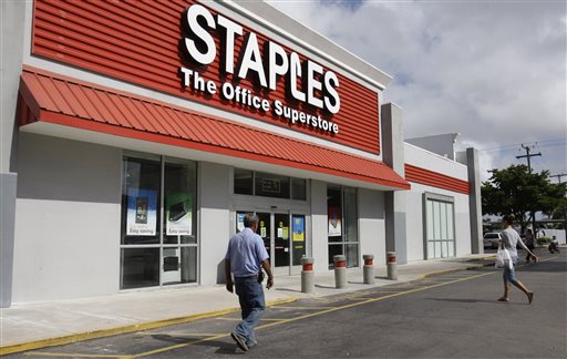 The opening of Postal Service retail centers in dozens of Staples stores around the country – like this one in Miami – is being met with threats of protests and boycotts by the agency's unions.