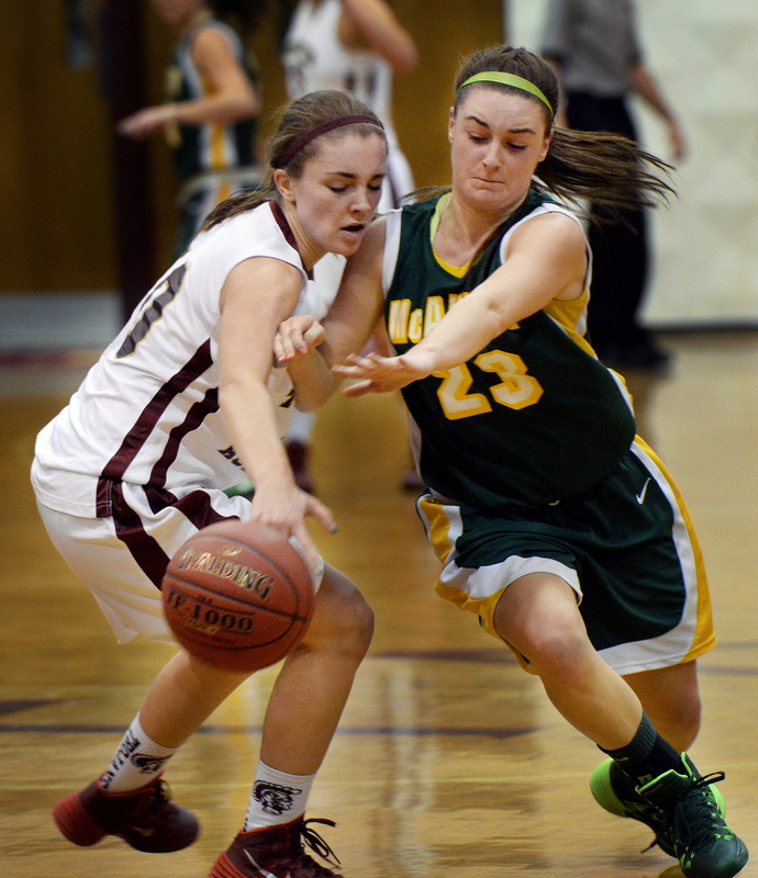 Catherine McAuley's Allie Clement steals the ball from Thornton Academy's Kaitlyn McCrum in girls basketball action Tuesday.