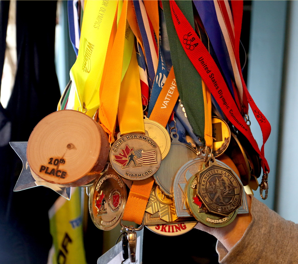 Medals that Russell Currier has won through his years competing as a biathlete.