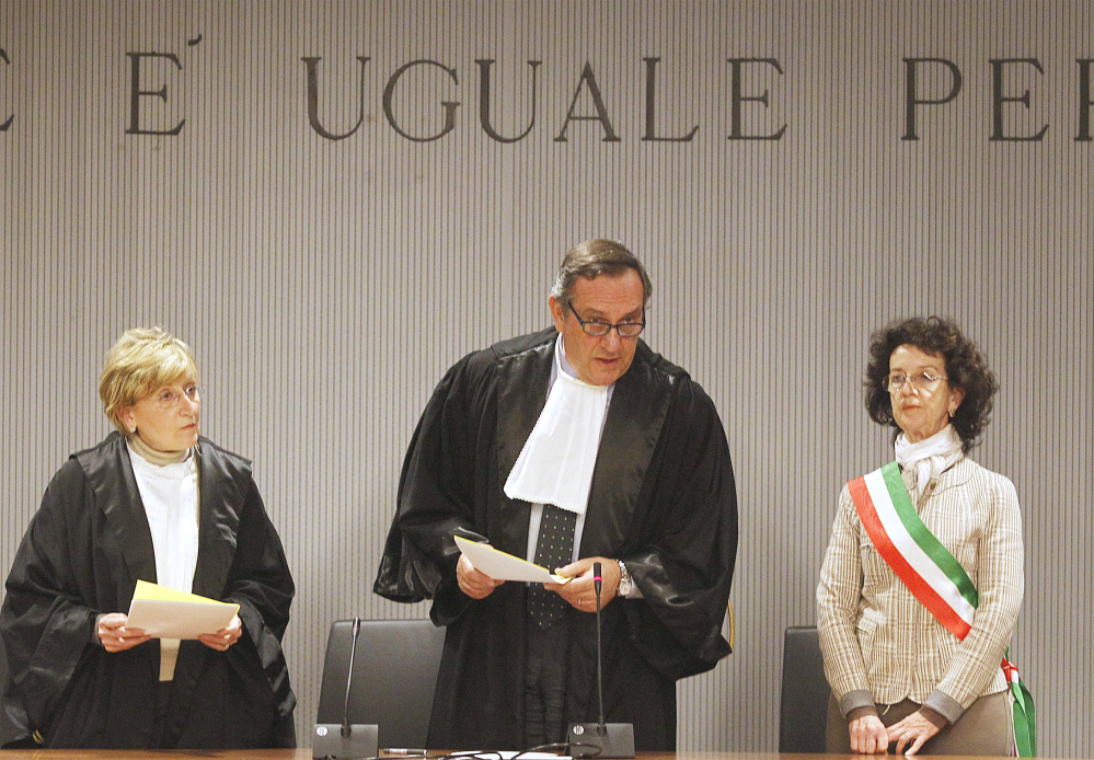 The Associated Press Appeals Court Judge Alessandro Nencini, center, reads out the verdict for the murder of British student Meredith Kercher, in Florence, Italy, Thursday.