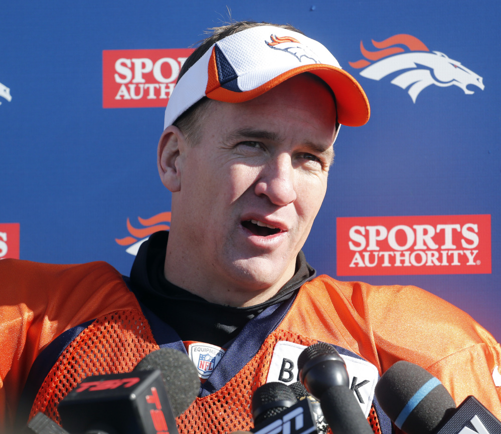 Denver Broncos quarterback Peyton Manning talks to the media after NFL football practice at the team’s training facility in Englewood, Colo., on Thursday.