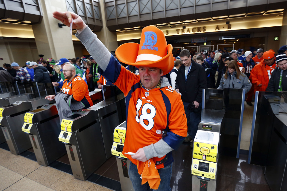 Football fans enter the Secaucus Junction, on Sunday in Secaucus, N.J. The Seattle Seahawks play the Denver Broncos in the Super Bowl XLVIII on Sunday evening at MetLife Stadium in East Rutherford, N.J.