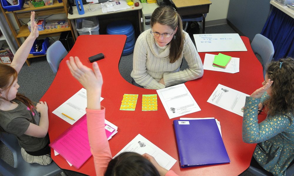 TALKING NUMBERS: Readfield Elementary School third grade teacher Abby Shink leads her class Wednesday through a “number talk,” an instructional activity RSU 38 uses to get students to discuss and critique arguments in math, as required in the Common Core State Standards.