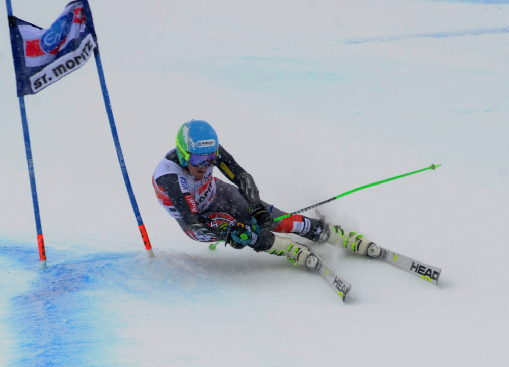 Ted Ligety of the United States speeds down the course during the first run of the World Cup giant slalom in St. Moritz, , Switzerland, on Sunday.