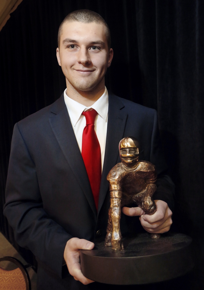 MOVING ON: Ben Lucas, quarterback for Cony High School, won the James L. Fitzpatrick Trophy last minth at Holiday Inn by The Bay in Portland. Lucas, who finished his high school career with 7.575 yards and 89 touchdowns, will sign with the University of Maine today.