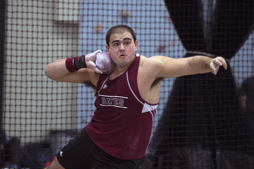 Nick Margitza '16 competes in the shot put at the New England Division III track and field championship on February 16, 2013.