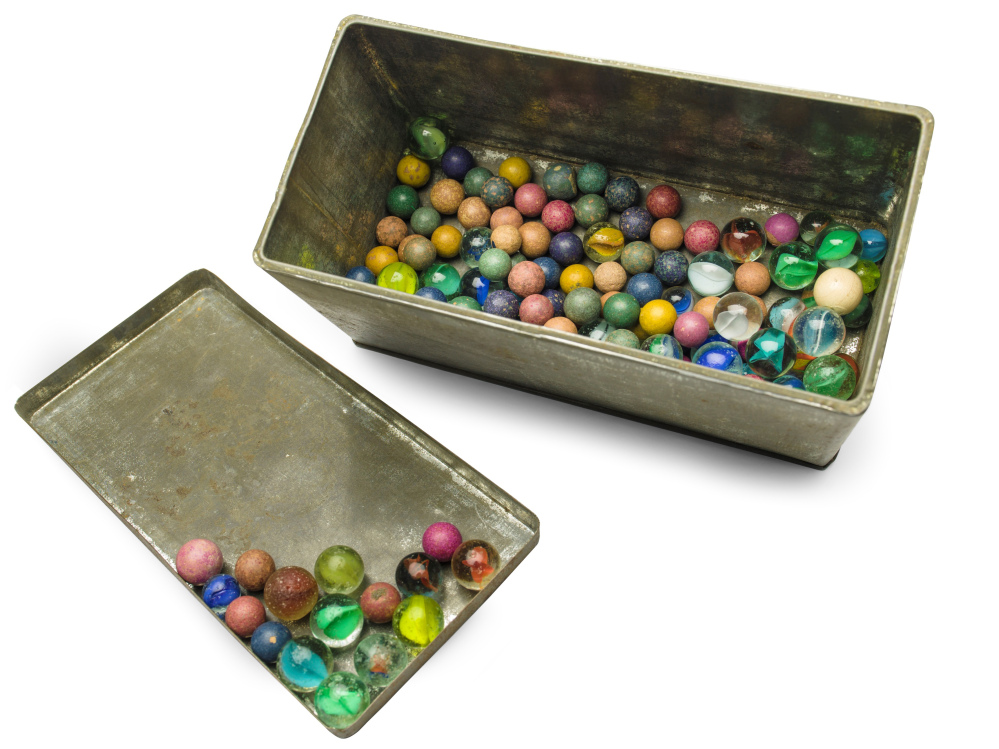 This Nov. 14, 2013 photo provided by the Anne Frank House Amsterdam on Tuesday, Feb. 4, 2014, shows a set of marbles belonging to Anne Frank.