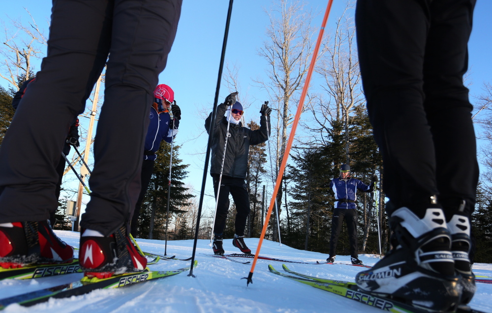 Will Sweetser of the Maine Winter Sports Center leads skiers through a workout at the Nordic Heritage Center in Presque Isle. Six athletes who trained at the center will compete in the Winter Olympics in Sochi, Russia.