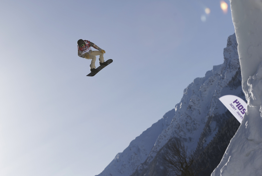 Shaun White of the United States takes a jump during a Snowboard Slopestyle training session at the Rosa Khutor Extreme Park in Krasnaya Polyana, Russia, prior to the 2014 Winter Olympics.