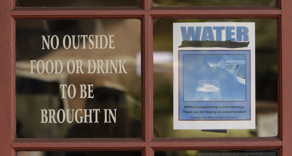 Diners at the Country Skillet restaurant in Willits, Calif., are reminded of the water shortage facing the community. Willits city leaders have banned lawn watering, car washing and have asked restaurants to serve water only upon request.