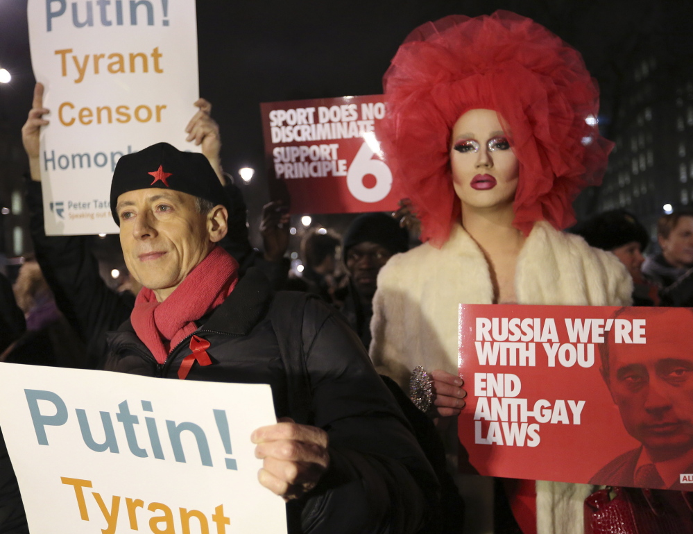 Demonstrators protest Russia’s anti-gay policies in London on Tuesday. The protest was held as part of Global Speakout for Russia, which is taking place in more than 30 cities across the globe ahead of the Winter Olympic Games.
