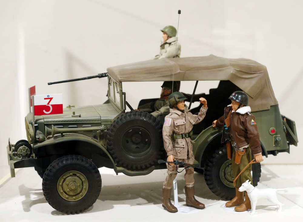 A Gen. George Patton G.I. Joe action figure, right, and other G.I. Joes in a display at the New York State Military Museum in Saratoga Springs, N.Y.