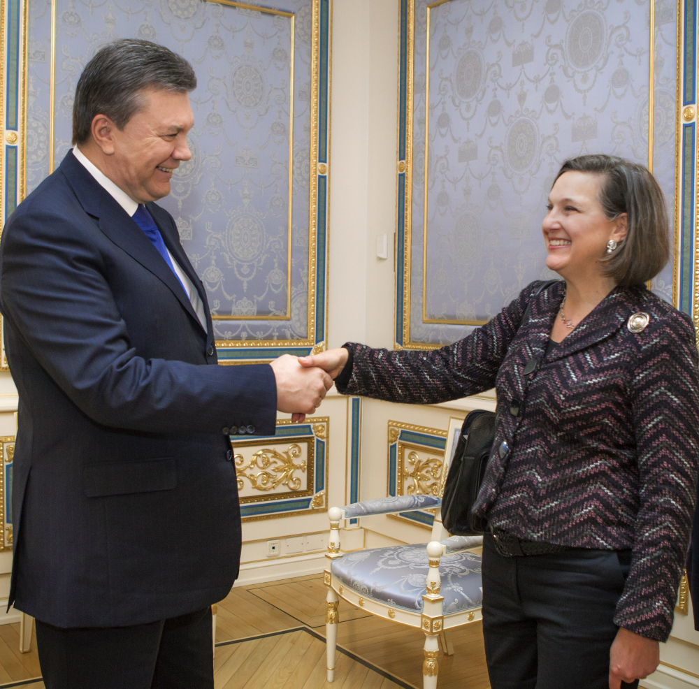 Ukraine’s President Viktor Yanukovych greets U.S. Assistant Secretary for European and Eurasian Affairs Victoria Nuland in Kiev, Ukraine, Thursday. The senior U.S. diplomat is in the Ukrainian capital to try to help find a resolution to the protests and political crisis that have gripped the country for more than two months.
