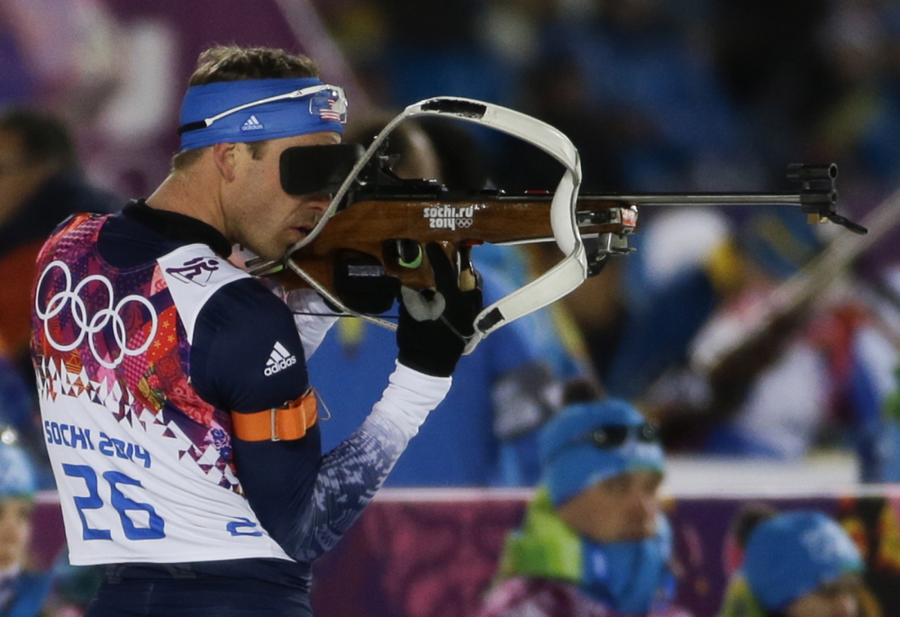 Lowell Bailey, who trains at the Maine Winter Sports Center, shoots during the men’s biathlon 10k sprint at the Winter Olympics on Saturday. Bailey placed 35th in the event.